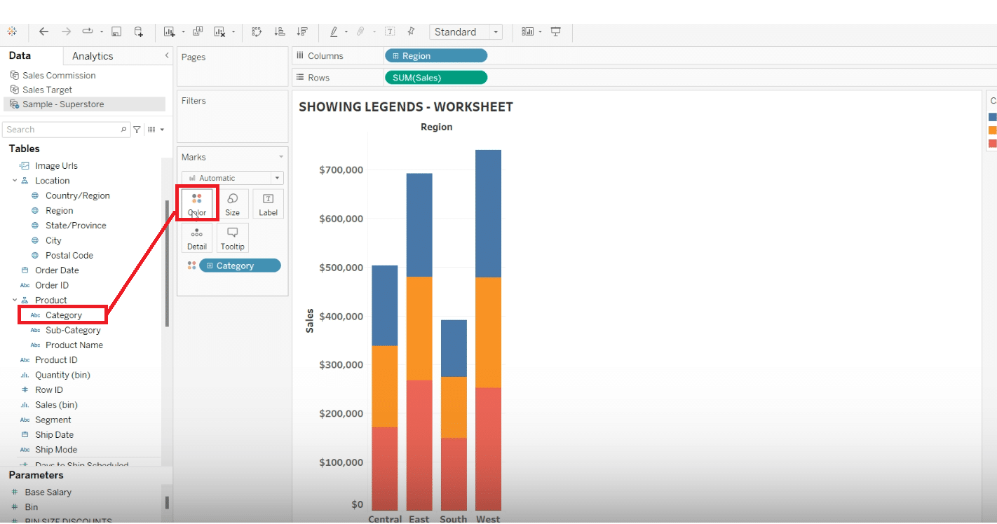 Dragging a field to the 'Color' mark on the 'Marks' card in Tableau to create a color legend for data points.